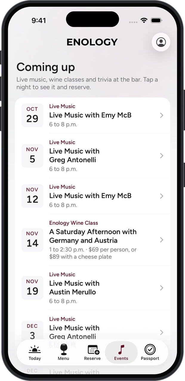 The Coming up screen listing live music nights and a wine class