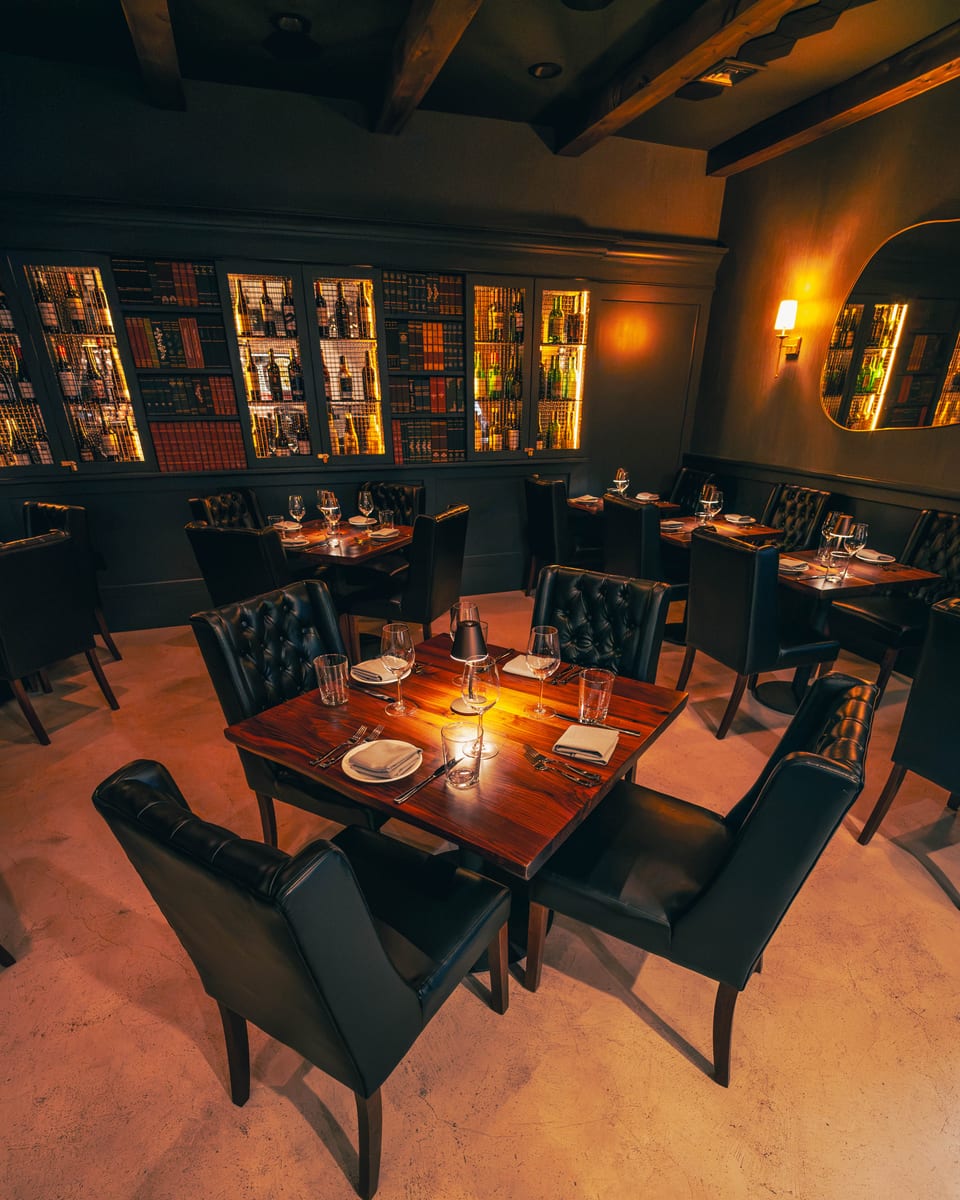 Floor to ceiling wine library at Enology