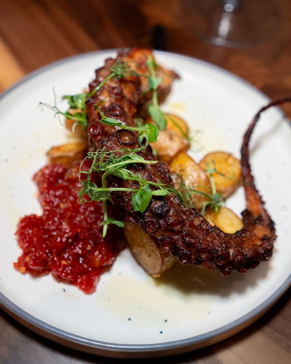 Grilled octopus with crushed potatoes, one of Chef Albert's plates at Enology Wine Bar and Bistro